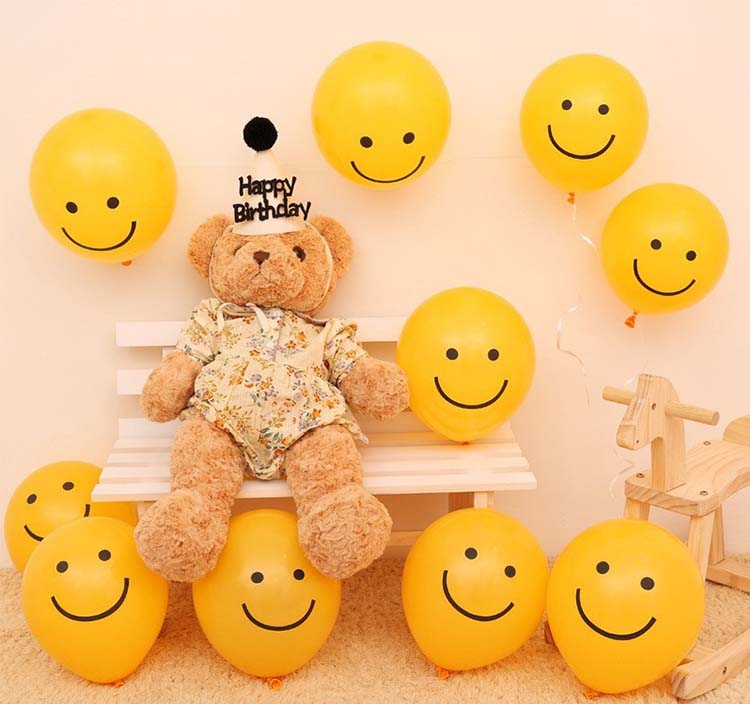 Smiley face latex balloon
