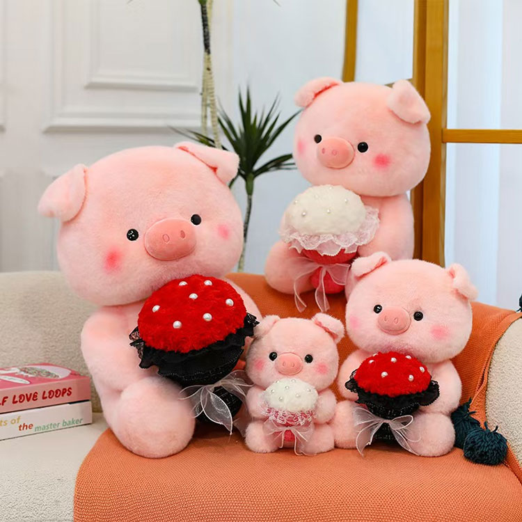 Peluche rosa con maialino e fiori